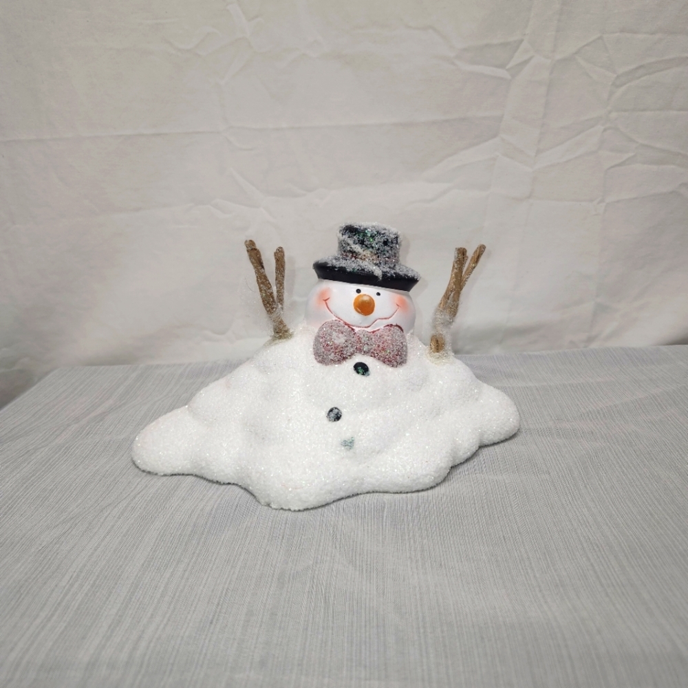 Melting Snowman figure